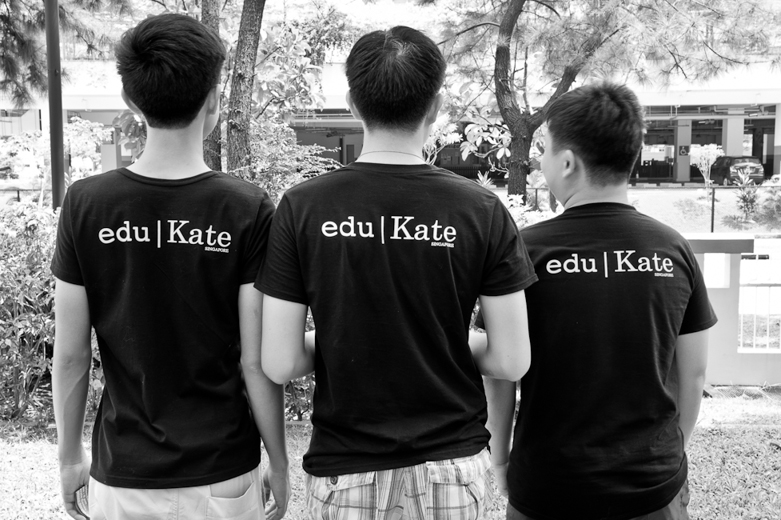 eduKate students wearing team T-shirts before a community event.