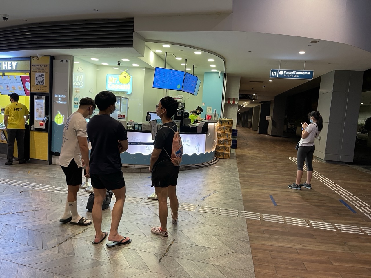 Punggol MRT station exit leading toward Waterway Point.