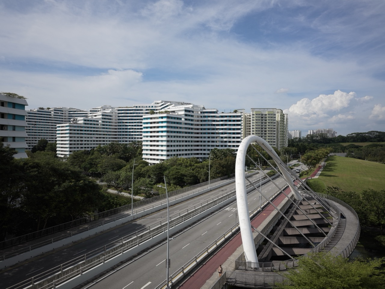 HDB flats and road beside a bridge over the Punggol Waterway