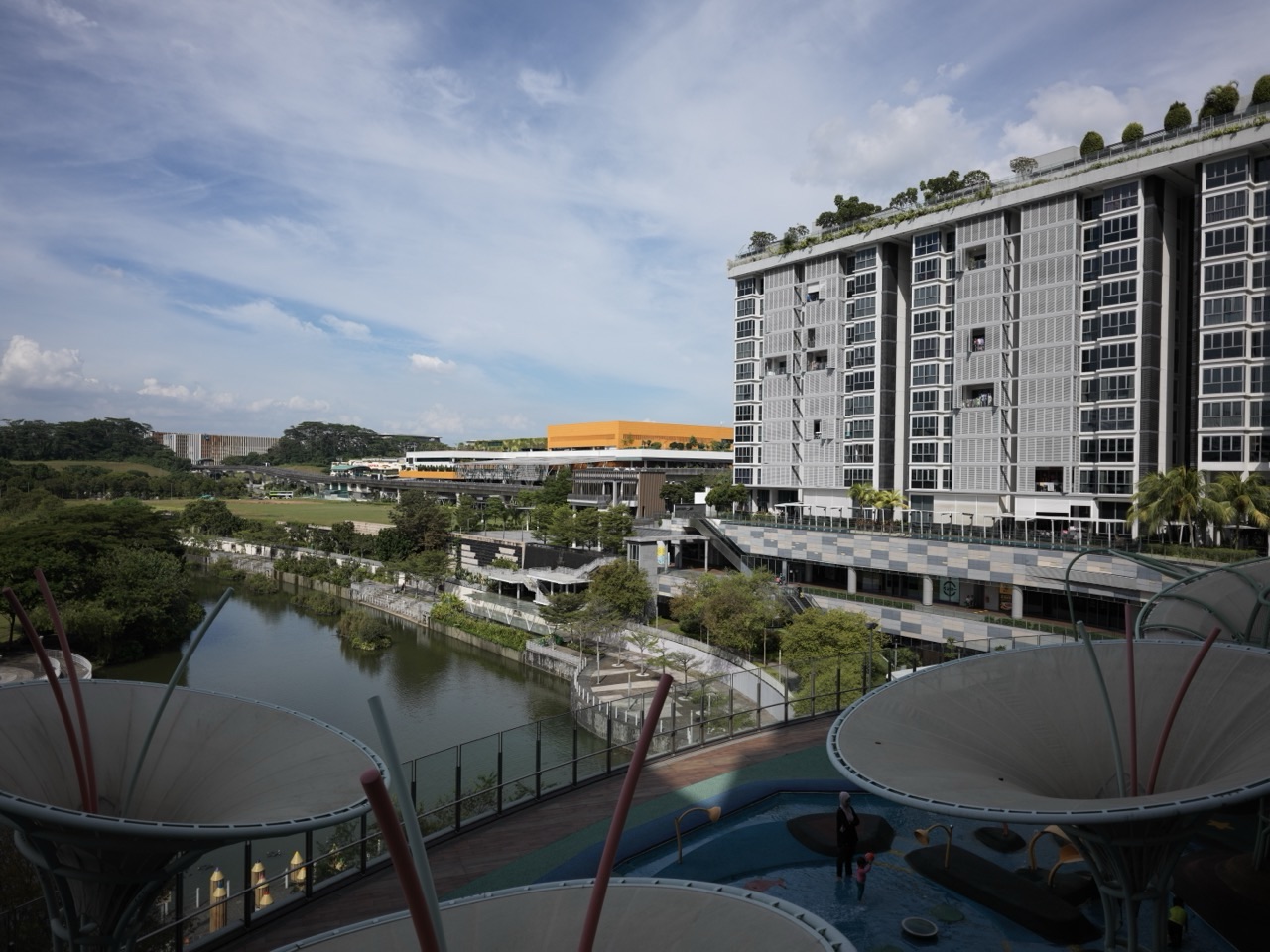Canal and bridge at Punggol Waterway Park beside Waterway Point