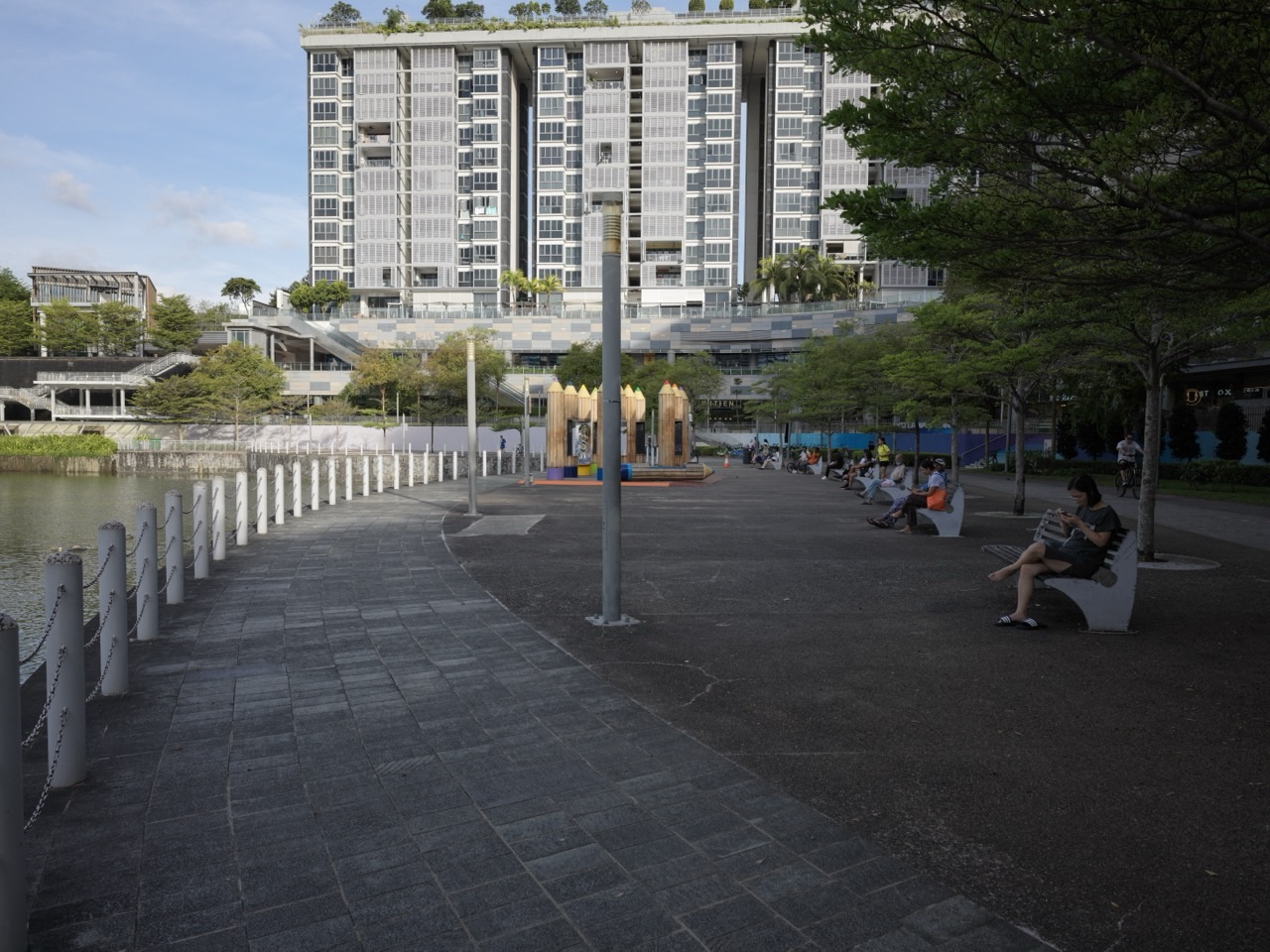 Canal, playground and seating at Punggol Waterway Park beside Waterway Point