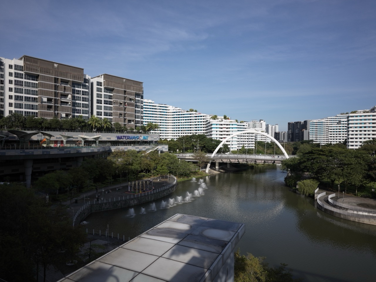 Canal and bridge at Punggol Waterway Park beside Waterway Point