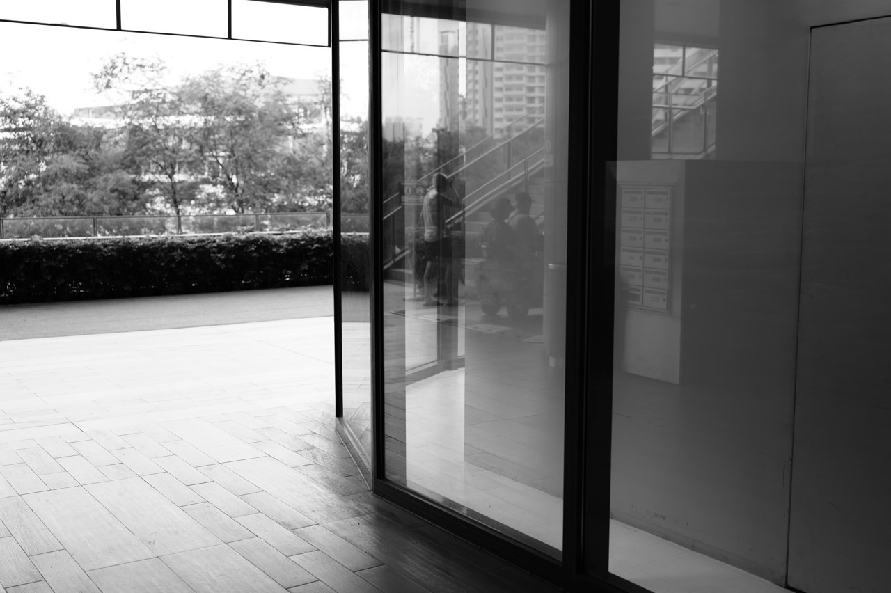 Watertown in Punggol with reflections of people