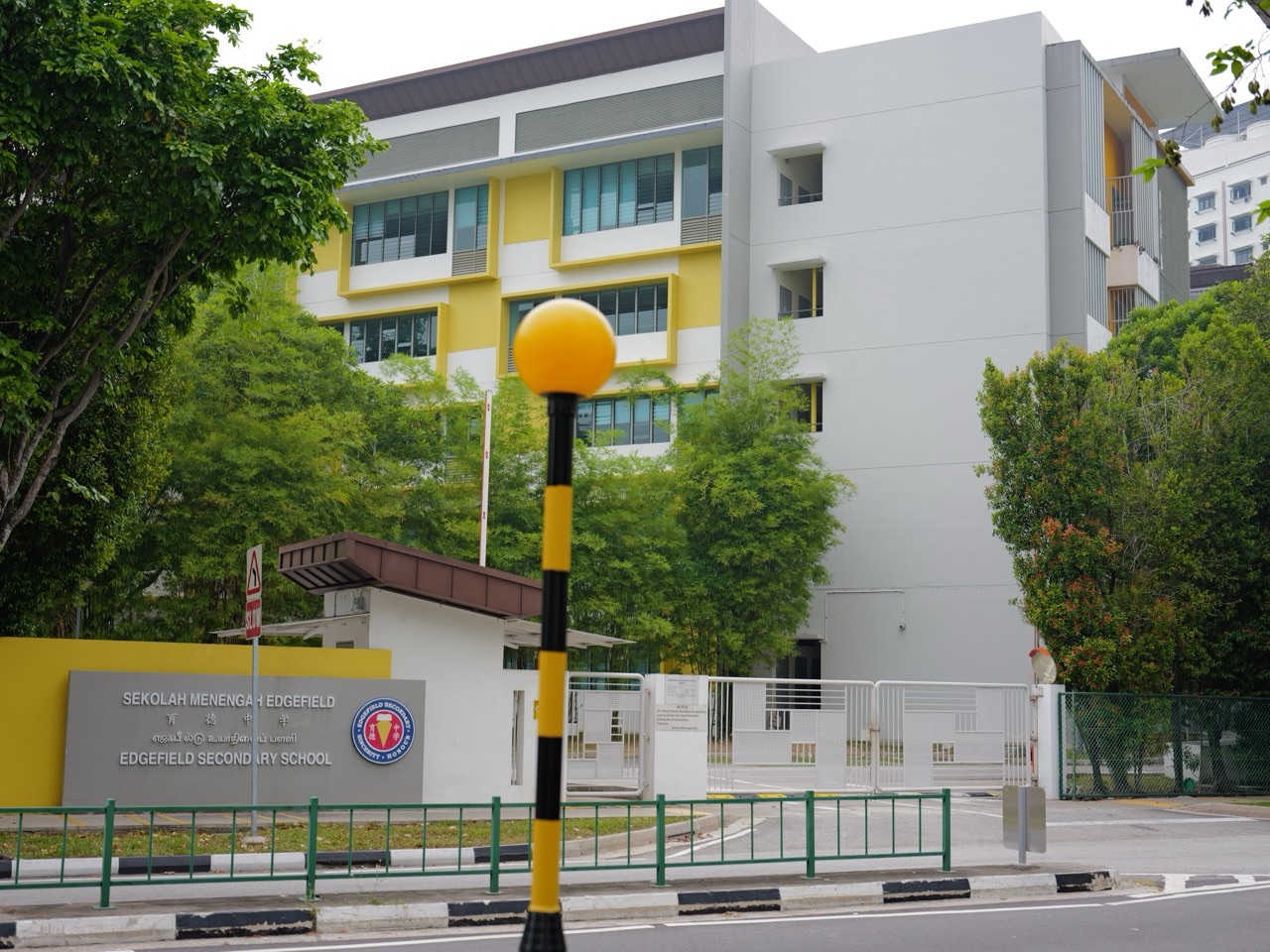 Main entrance gates and school building at Edgefield Secondary School in Punggol, Singapore.